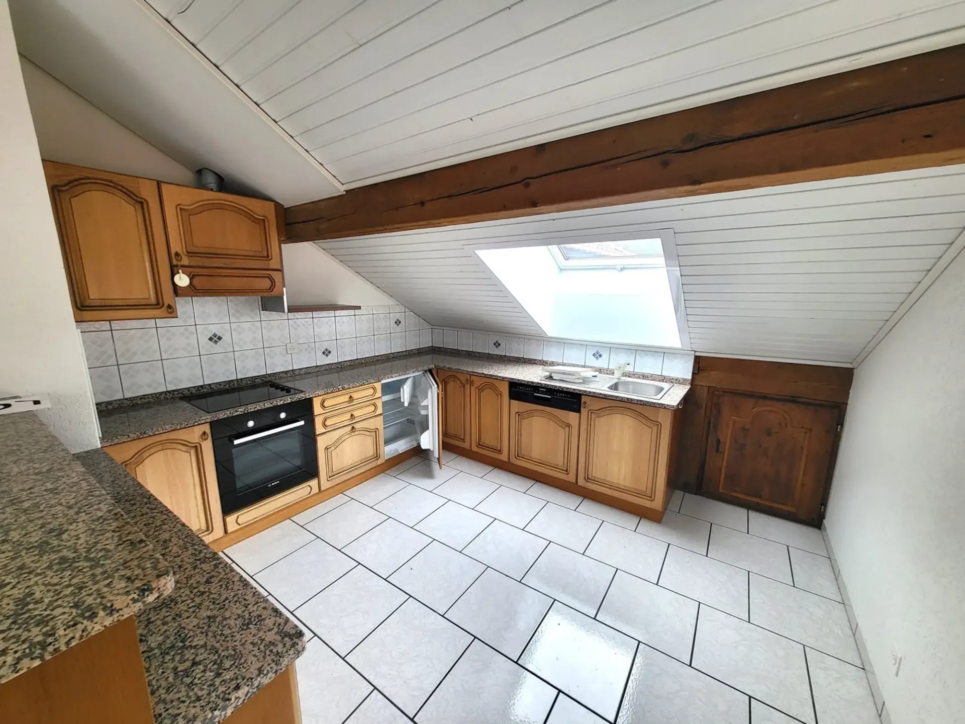 Dachwohnung mit 3 Zimmern und Balkon