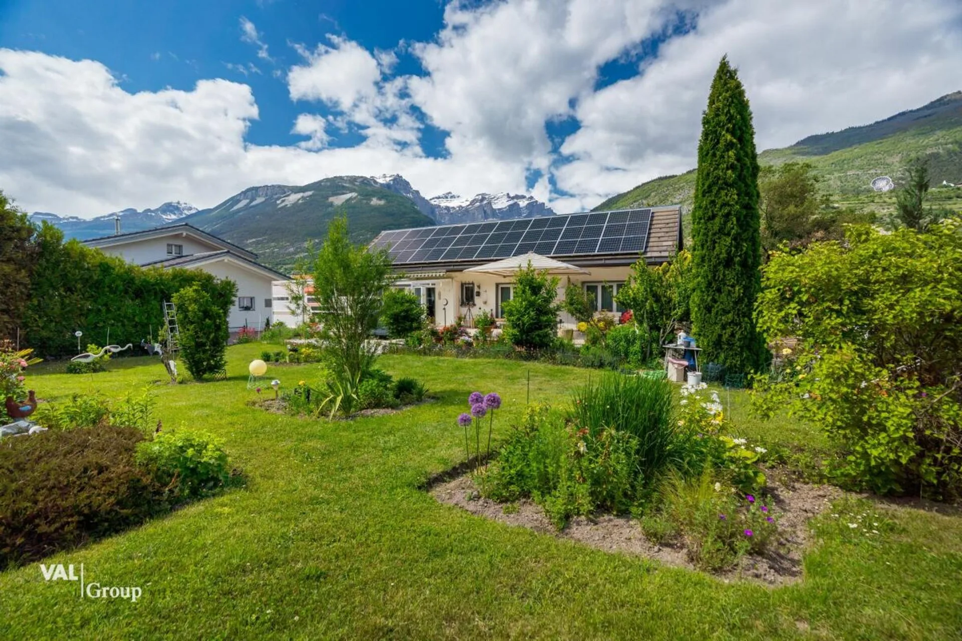 Ein Zuhause zum Wohlfühlen - mit Bauparzelle, Wintergarten und sonnigem Aussensitzplatz