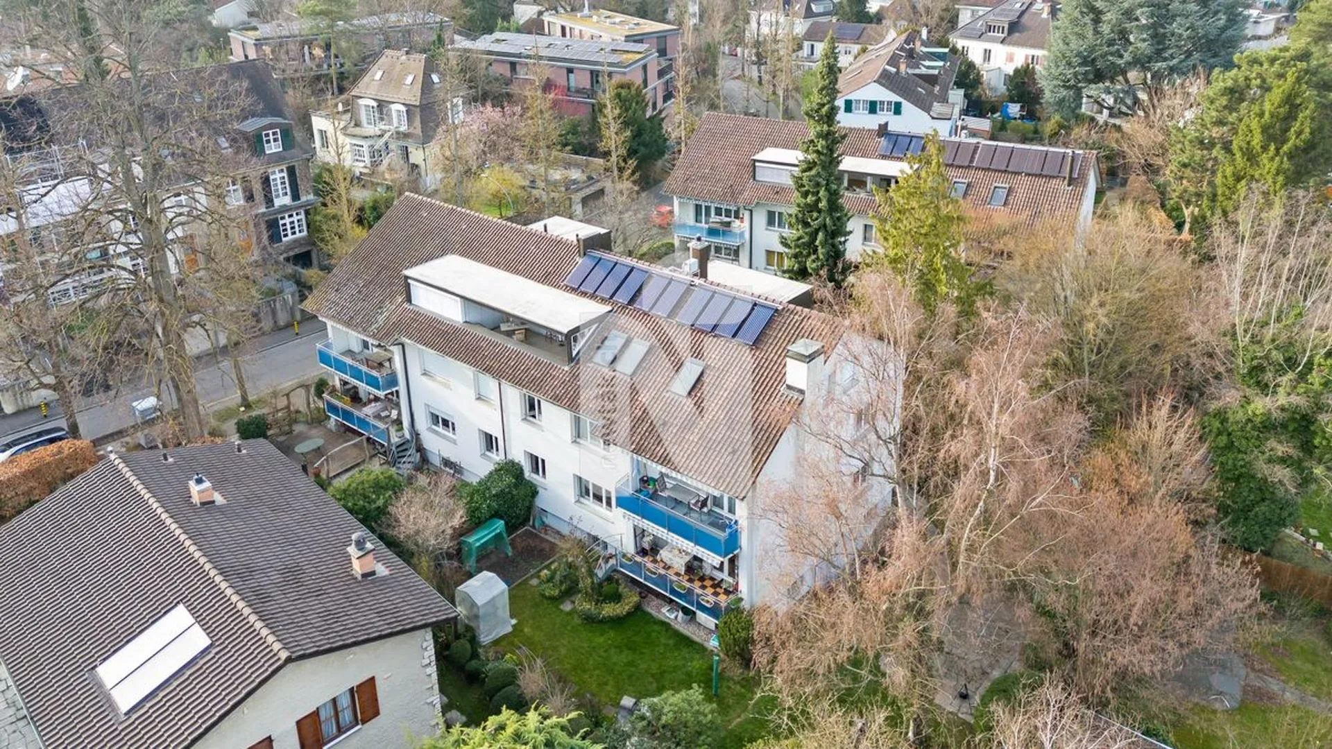 Reserved: Family-friendly garden apartment with balcony, private garden, garage box, and additional hobby room in a prime location on Bruderholz