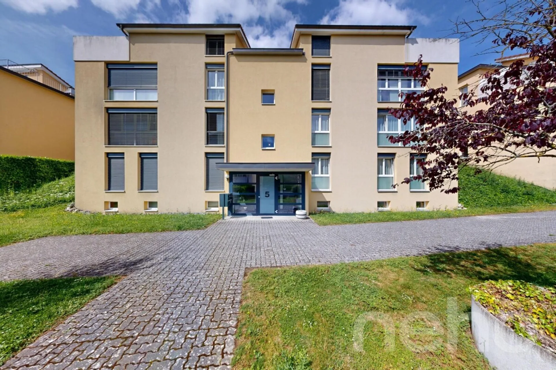 Duplex contemporain de 5,5 pièces avec jardin à Cortaillod
