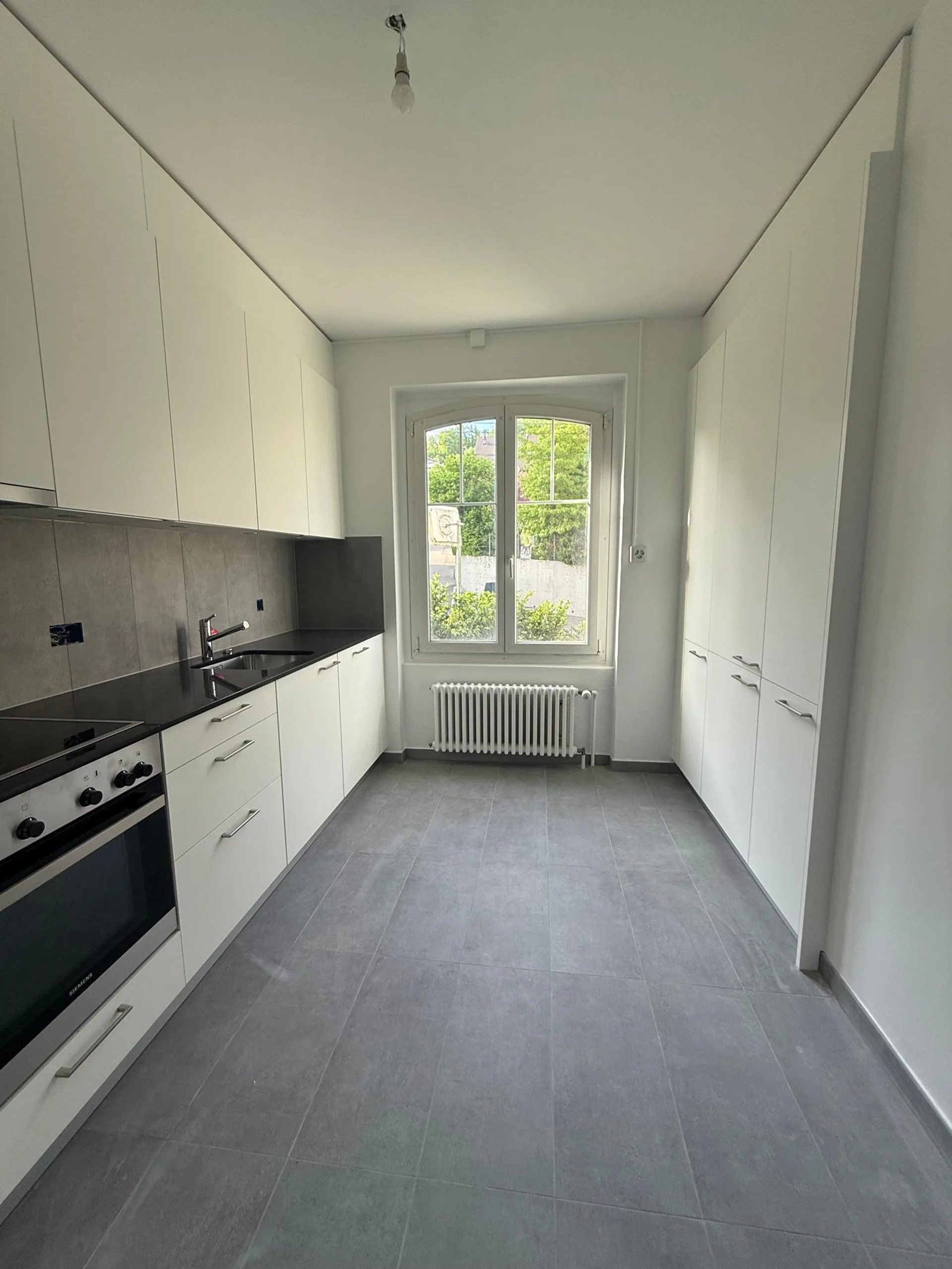3-room apartment completely renovated with balcony in Corcelles