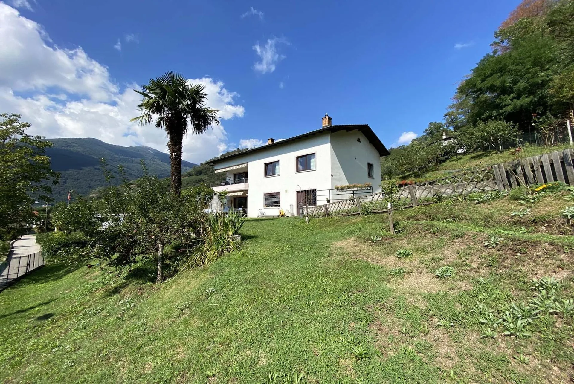 TWO-FAMILY HOUSE WITH 8.5 ROOMS AND BUILDING LAND IN LAMONE