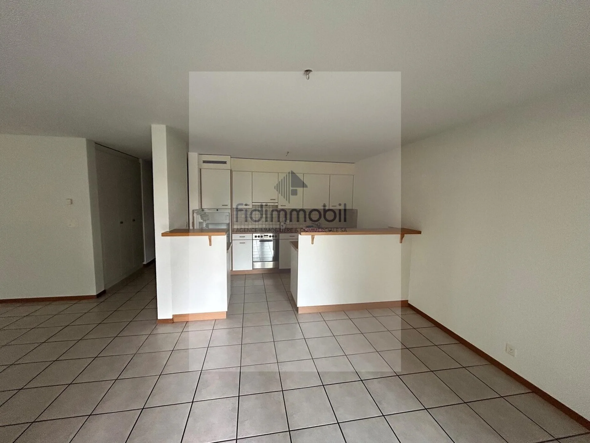 GROßES 2.5-ZIMMER-APARTMENT IM ERDGESCHOSS MIT TERRASSE