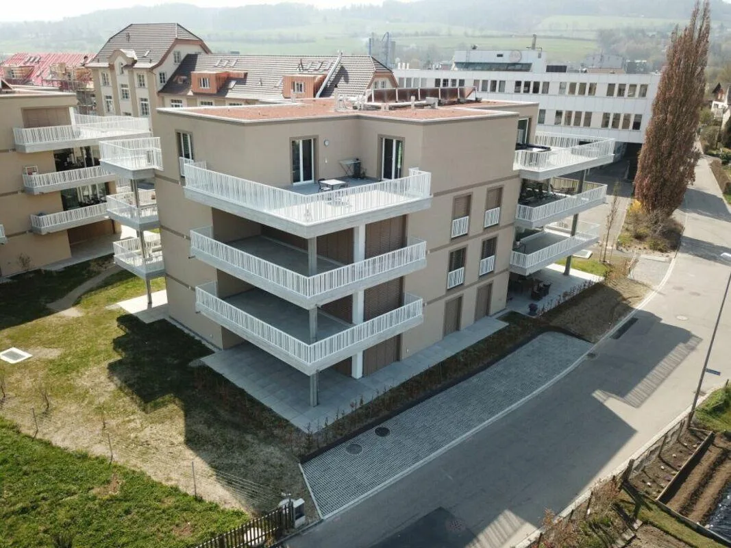 Moderne 4.5-Zimmerwohnung mit Garten direkt beim Bahnhof
