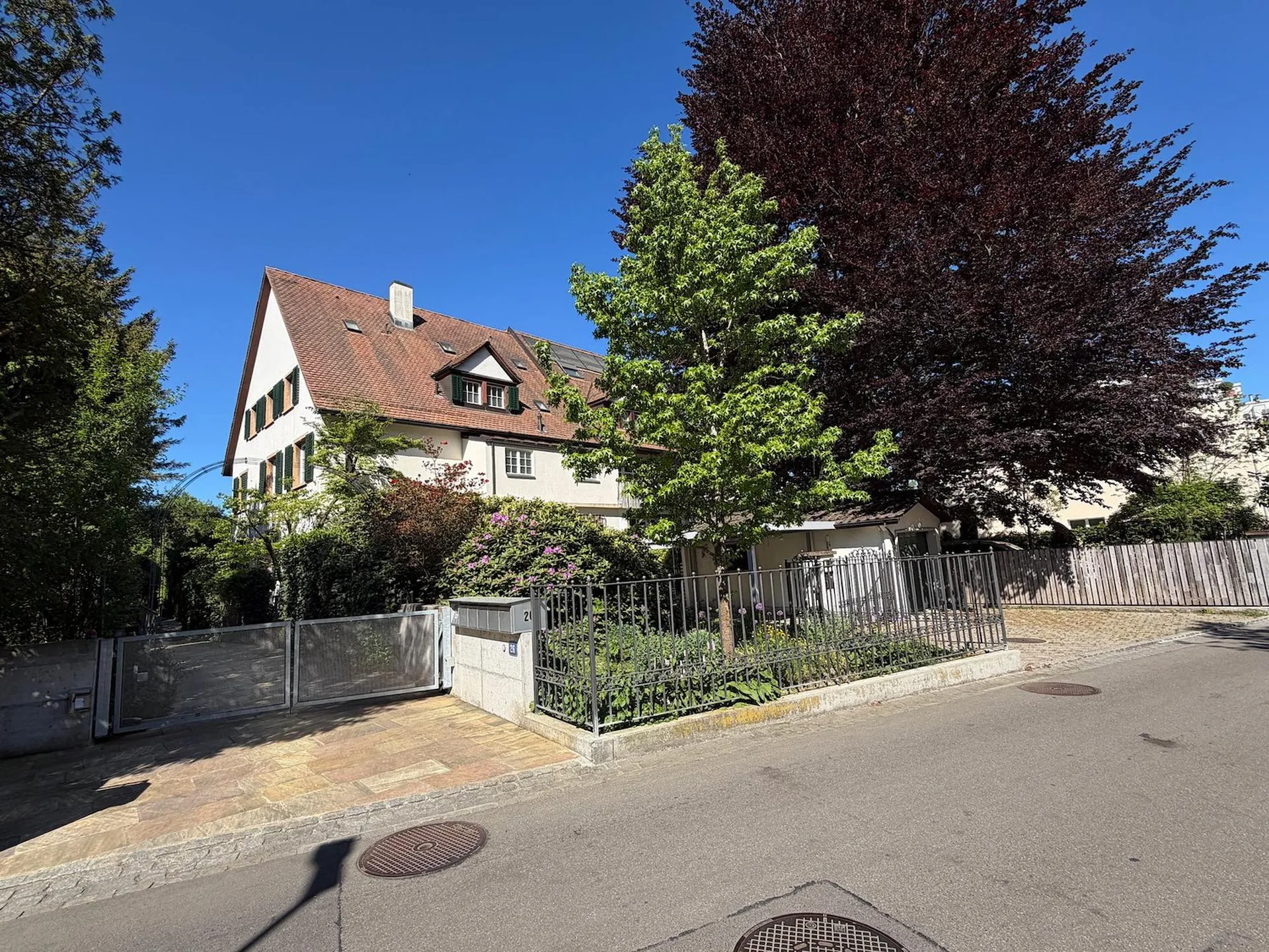 Stylish 10-Room Townhouse in a Prime Location in Riehen with a Stunning Garden and Garage Box