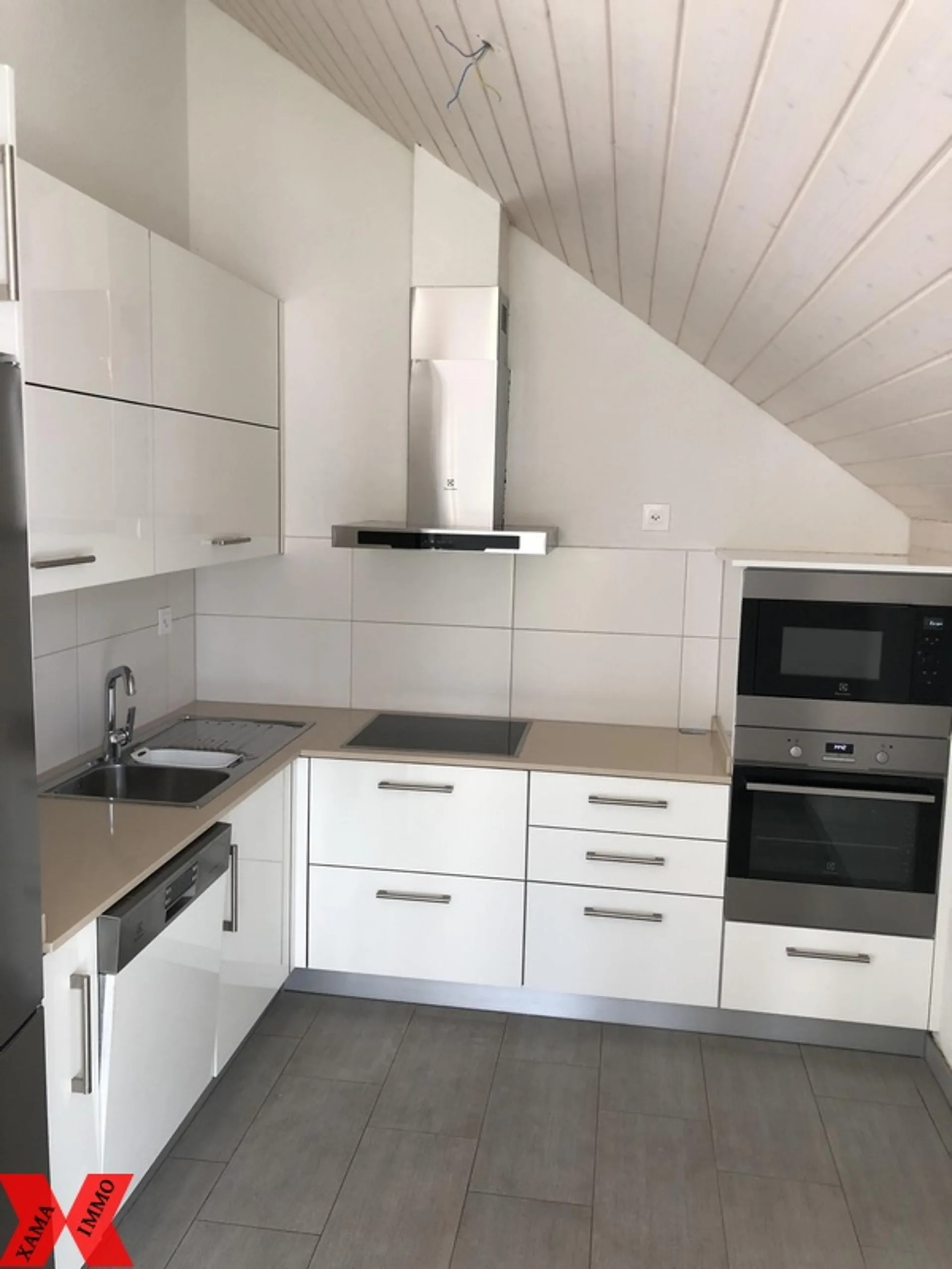 Wohnung mit 4,5 Zimmern im 2. Stock unter dem Dach