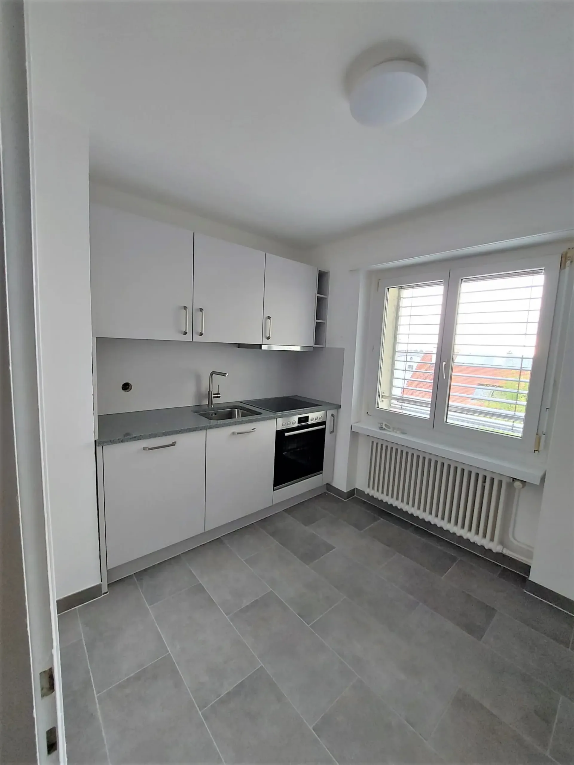 Sanierte 4.5-Zimmerwohnung mit Balkon und Lift