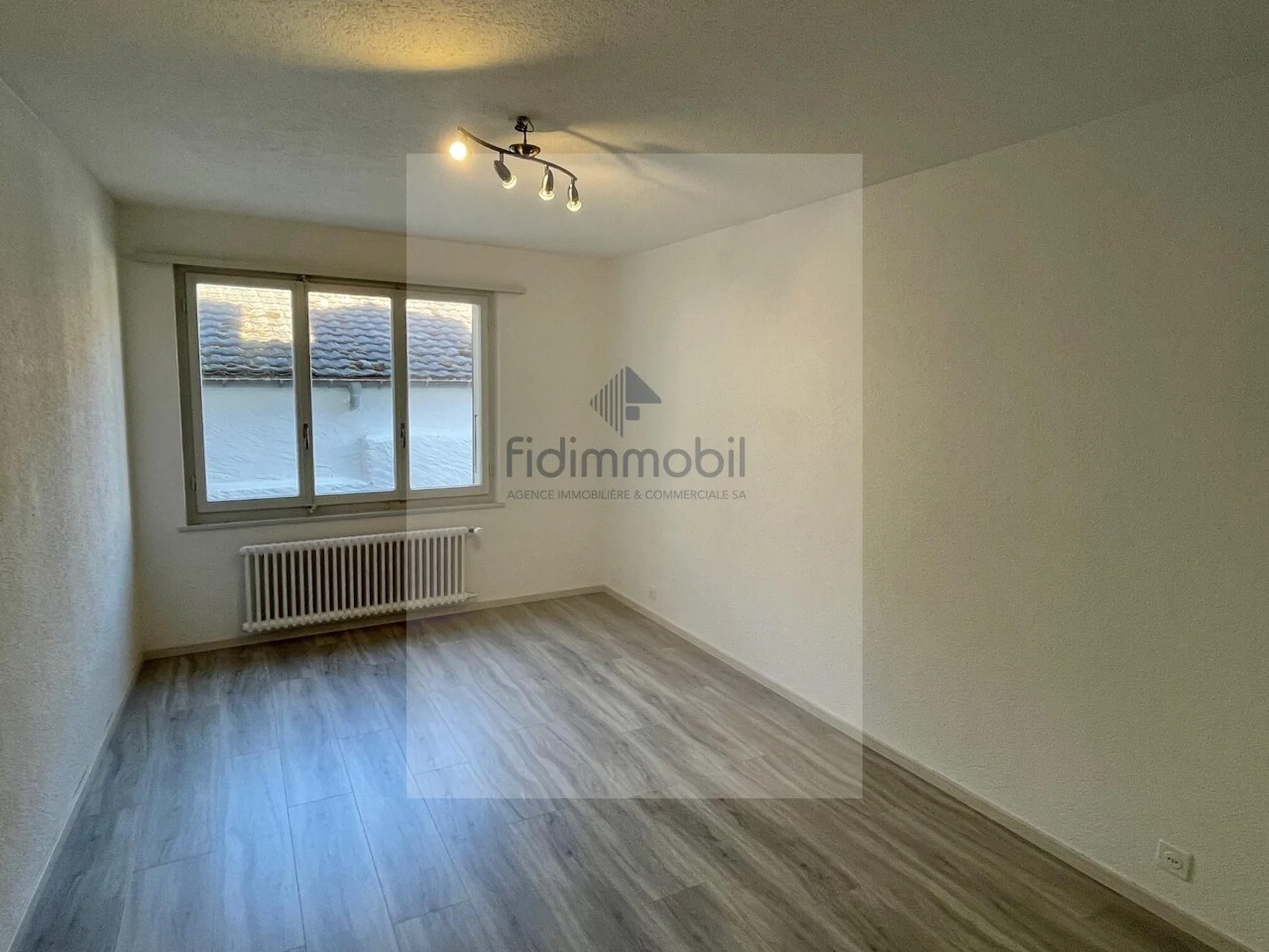 Wohnung mit 2.5 Zimmern in Cornaux