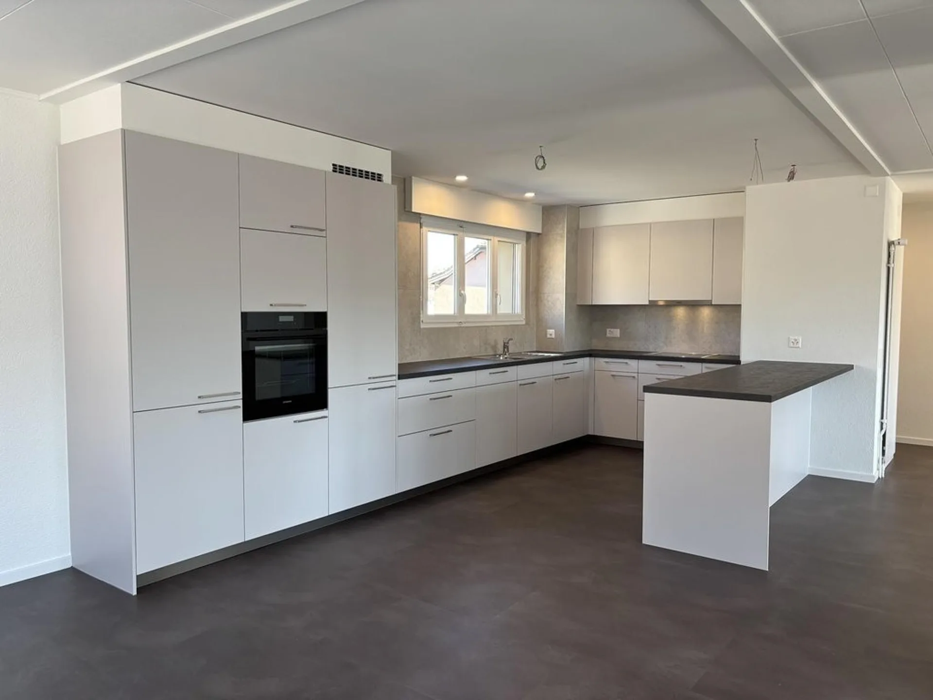 Ampio appartamento in attico con grande balcone
